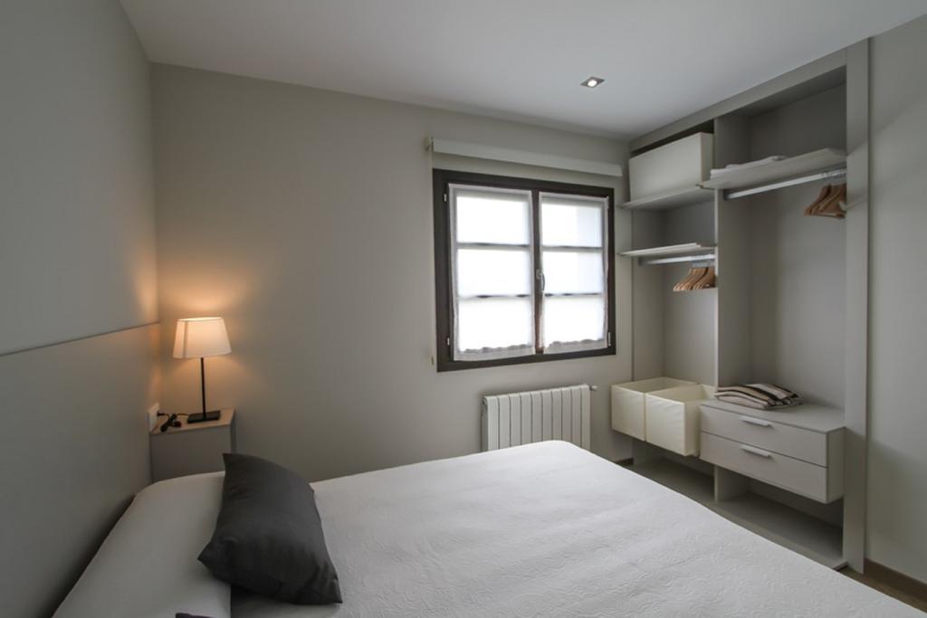 Apartamentos Andrín Habitación foto